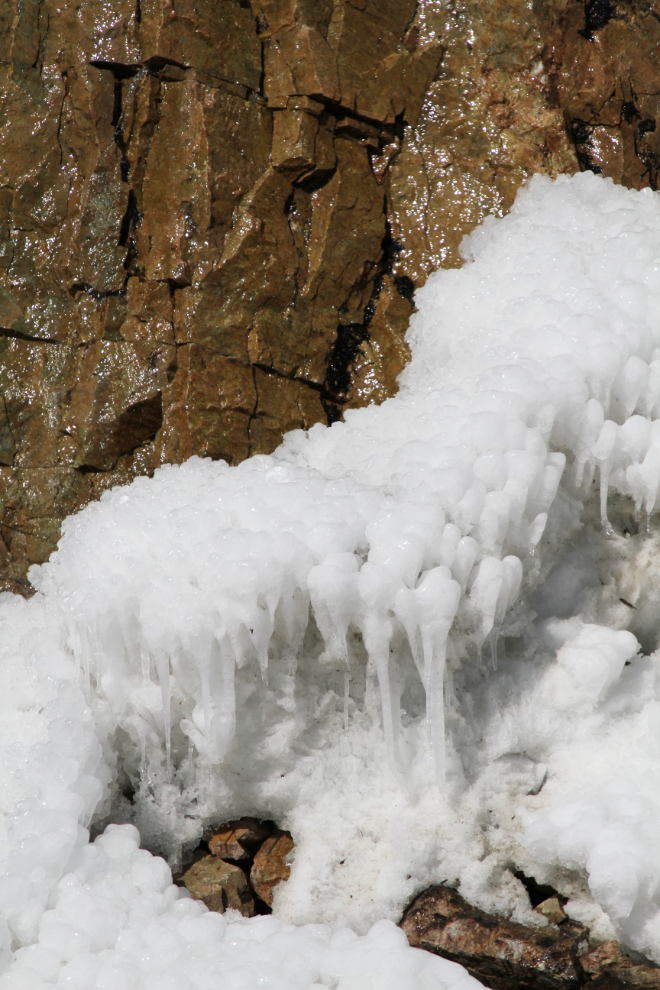 Partly-frozen waterfall in the White Pass