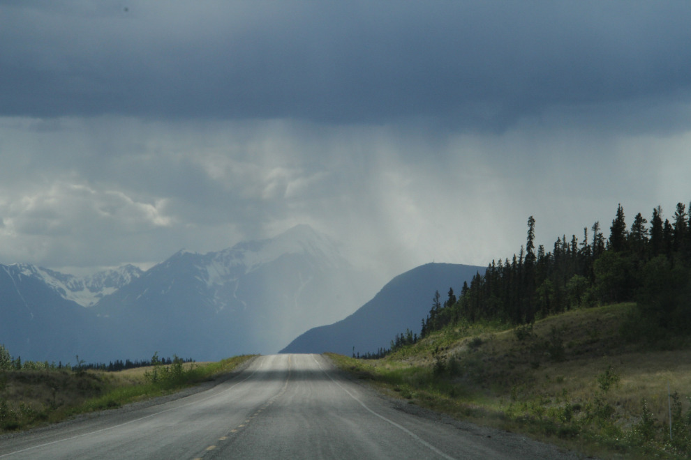 Rainstorm ahead on the Alaska Highway east of Haines Junction, Yukon