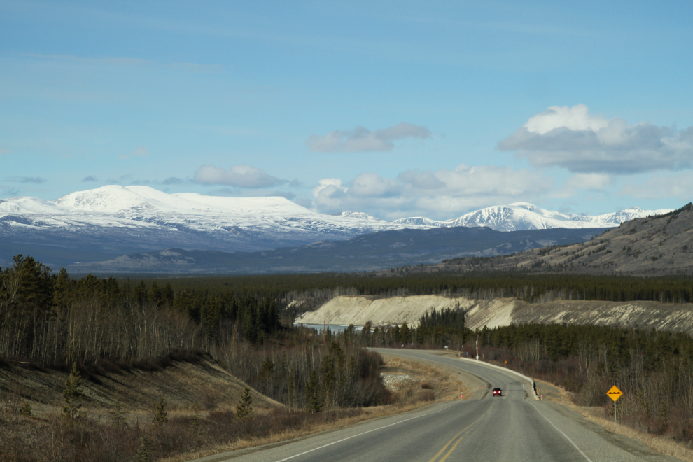 Looking west on the Alaska Highway to the pullout at Km 1454