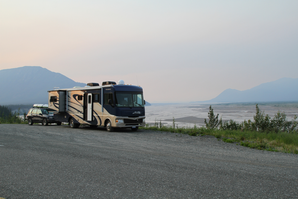 RV with a broad view across the White River, Yukon
