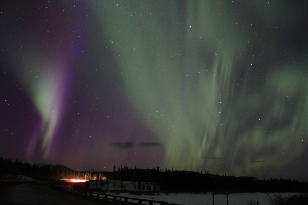 The aurora borealis in the Yukon, at the M'Clintock River Bridge, Alaska Highway