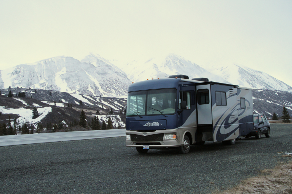 RV parked along the snowy Haines Highway