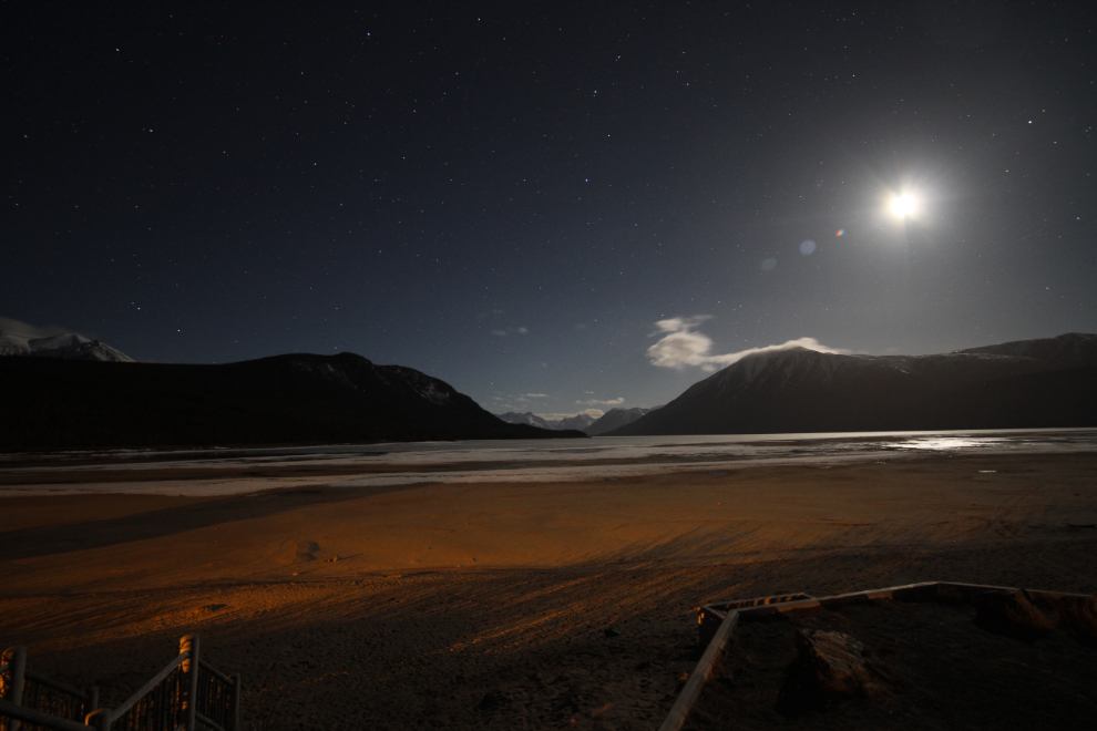 The beach at Lake Bennett in moonlight