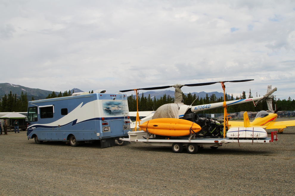 RV with a helicopter at the COPA fly-in at the Carcross airport, Yukon