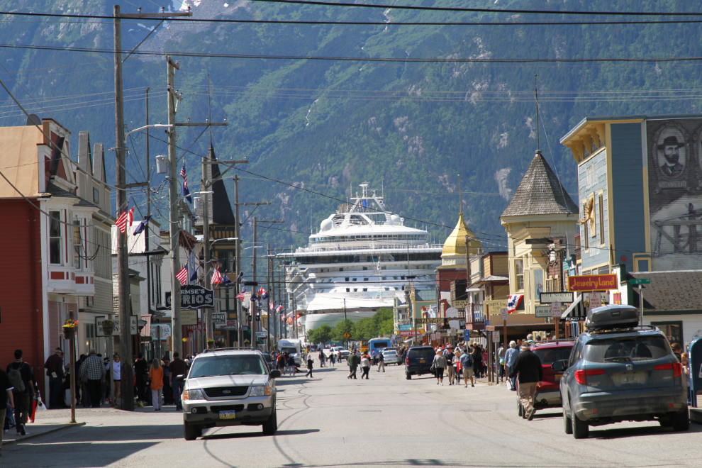 A cruise ship dominates Broadway in Skagway, Alaska