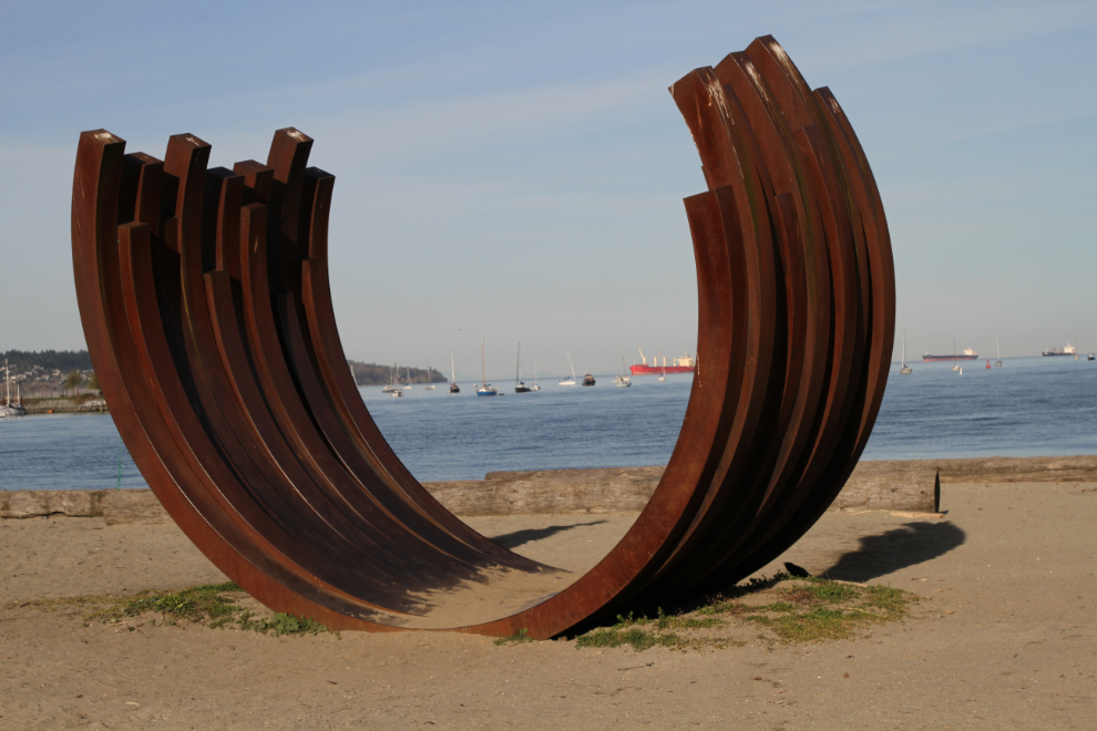A sculpture by Bernar Venet from France titled '217.5 arc x 13', on the beach in Vancouver, BC