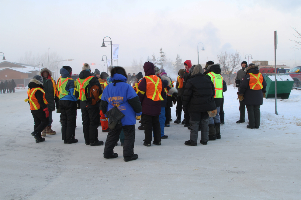 Volunteers at the start of the Yukon Quest 2019 sled dog race