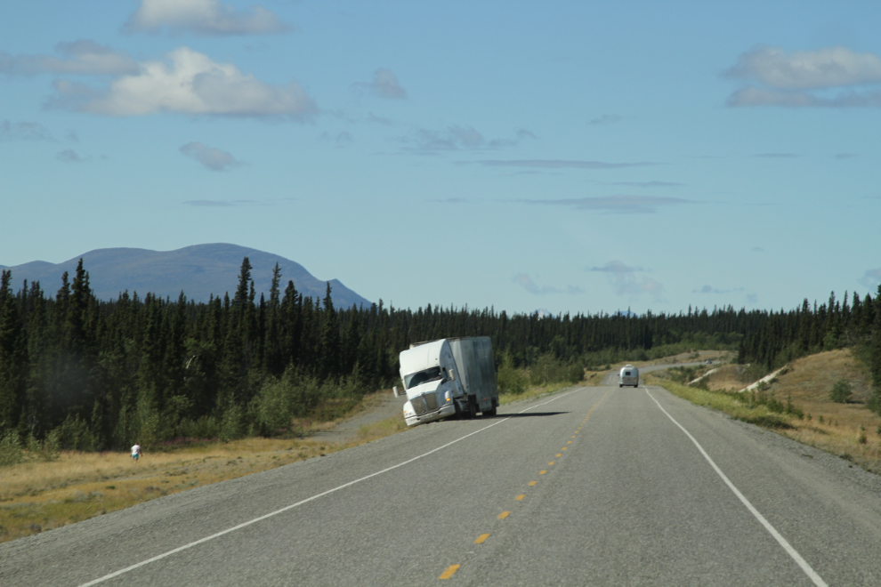 Soft shoulder on the Alaska Highway - truck stuck