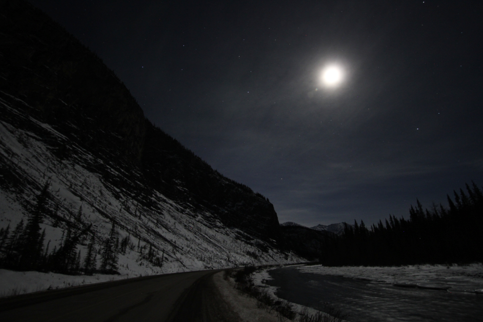 The Alaska Highway and Toad River in moonlight
