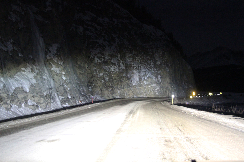 Driving along Muncho Lake at night