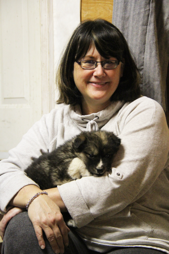 Cathy with YARN's rescued husky puppy Blackberry
