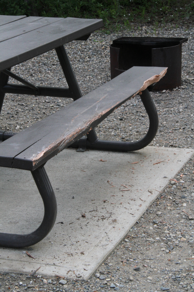 Damage to a picnic table from a motorhome