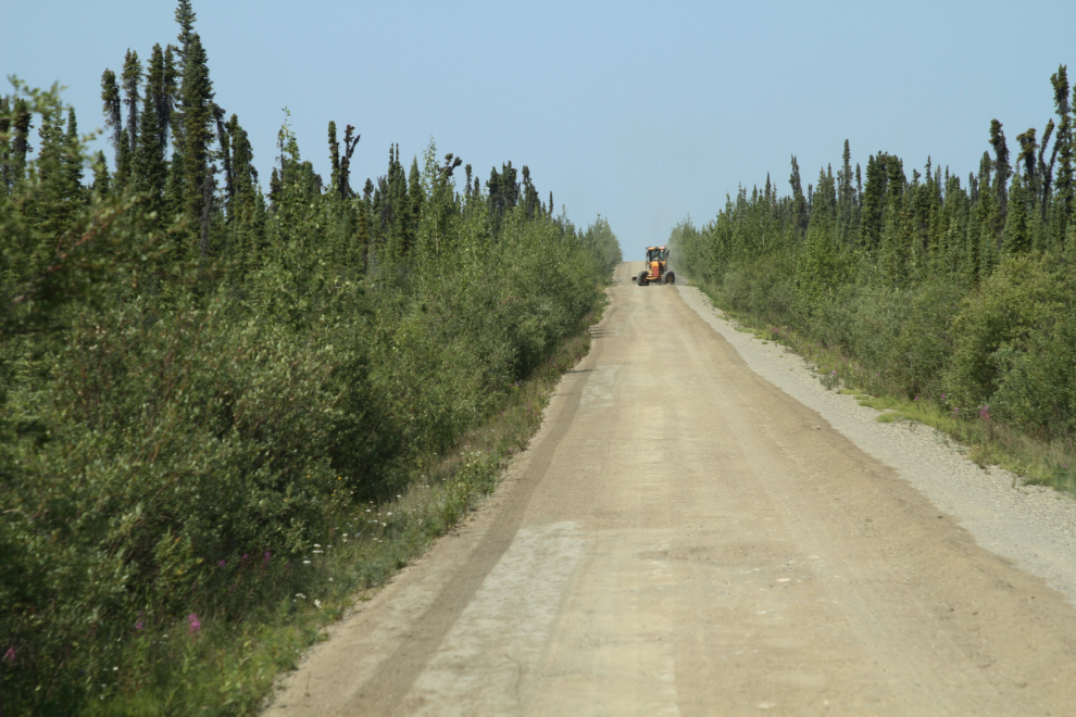 Grader on the Robert Campbell Highway, Yukon