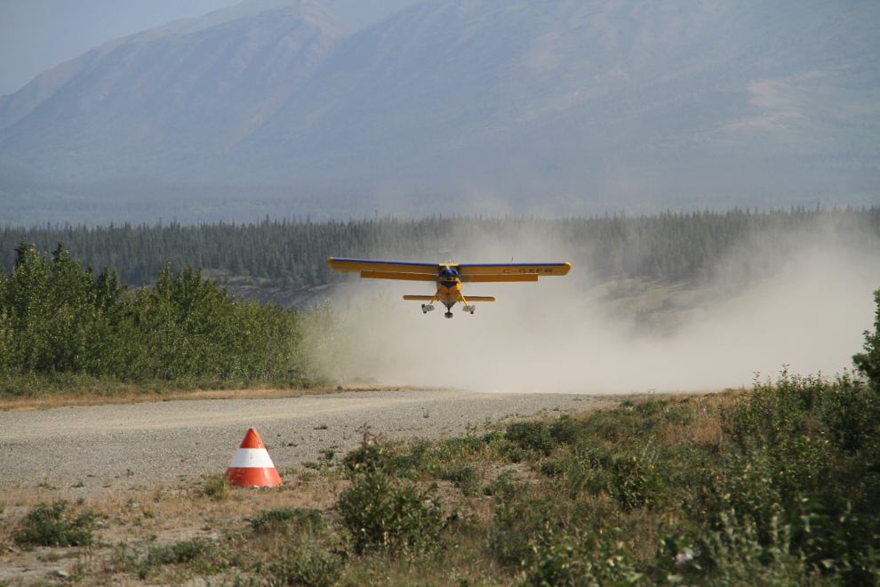 C-GXFB, a 1966 Helio H-295-1200 Super Courier, taking off from the Silver City airport in the Yukon