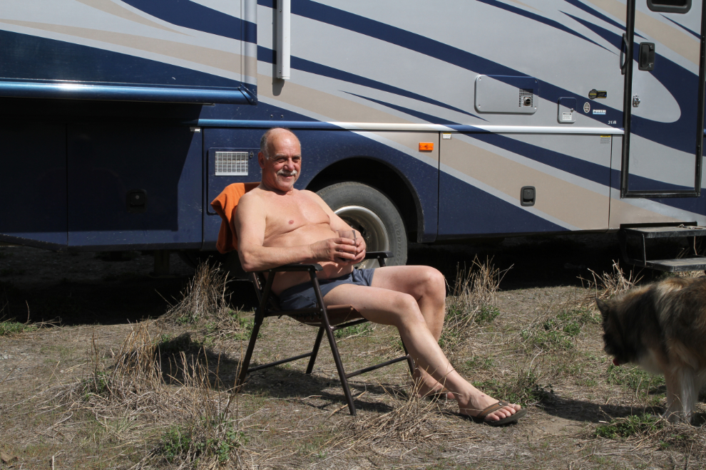 Murray relaxing in front of the RV at Farwell Canyon