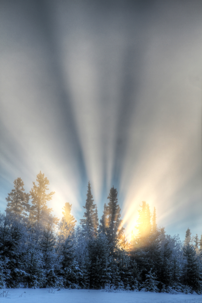 Crepuscular rays (a.k.a god beams) at Whitehorse, Yukon