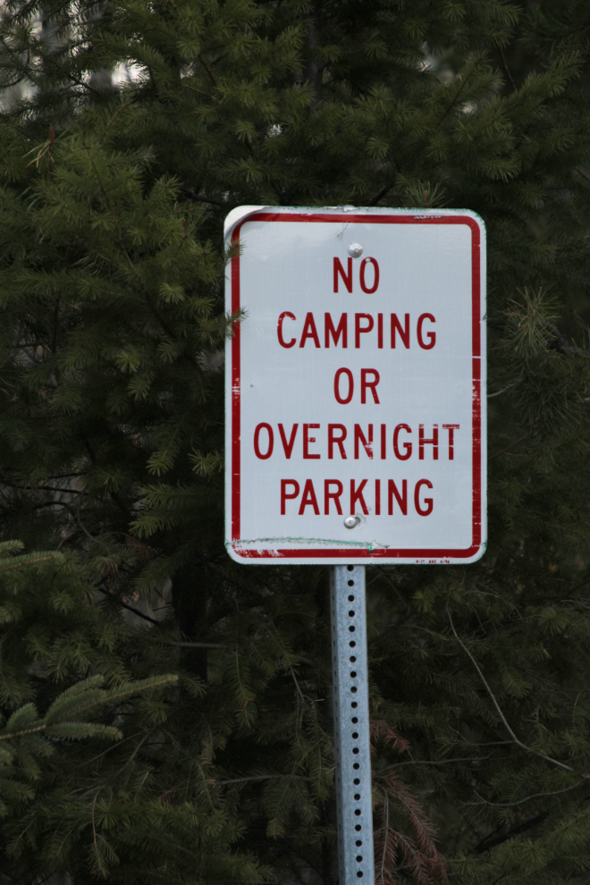 No camping or overnight parking sign