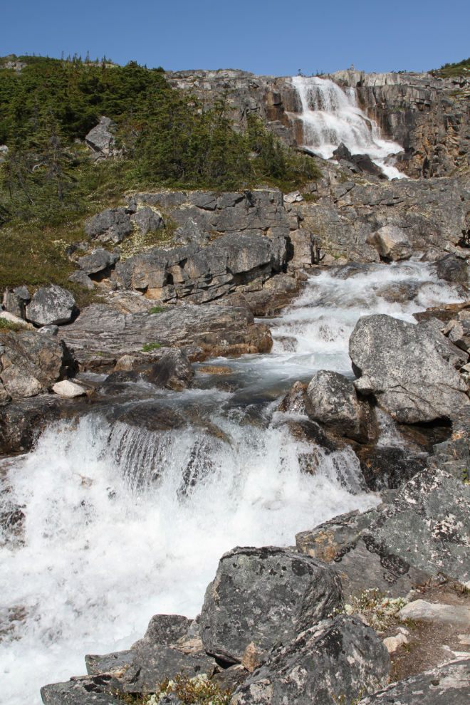 The highest of the many waterfalls along the International Falls Trail in the White Pass