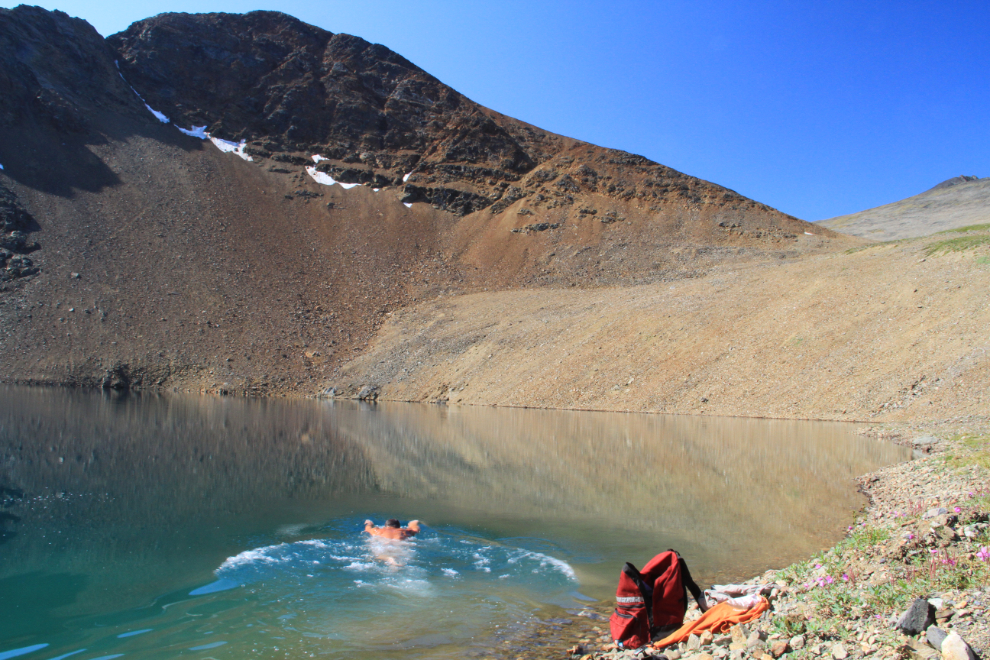 Swimming in a lake near Paddy Peak, BC / Yukon border