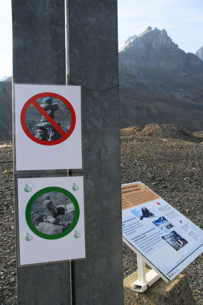 Signs at the Athabasca Glacier prohibit building cairns