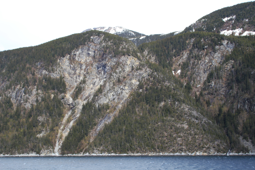 Cliffs and rockslides along Taiya Inlet, Alaska