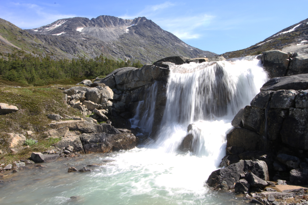 A waterfall high above the White Pass