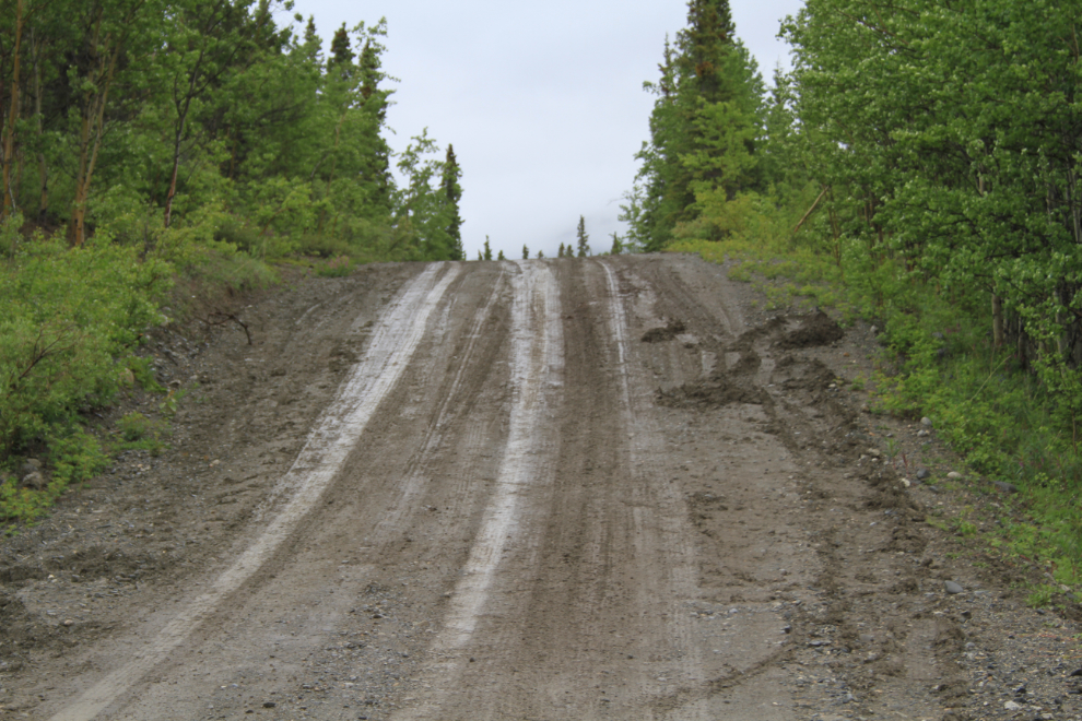 Muddy hill on the Aishihik Road, Yukon