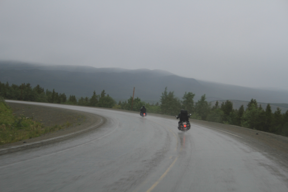 Harleys on the Alaska Highway in a cold rain