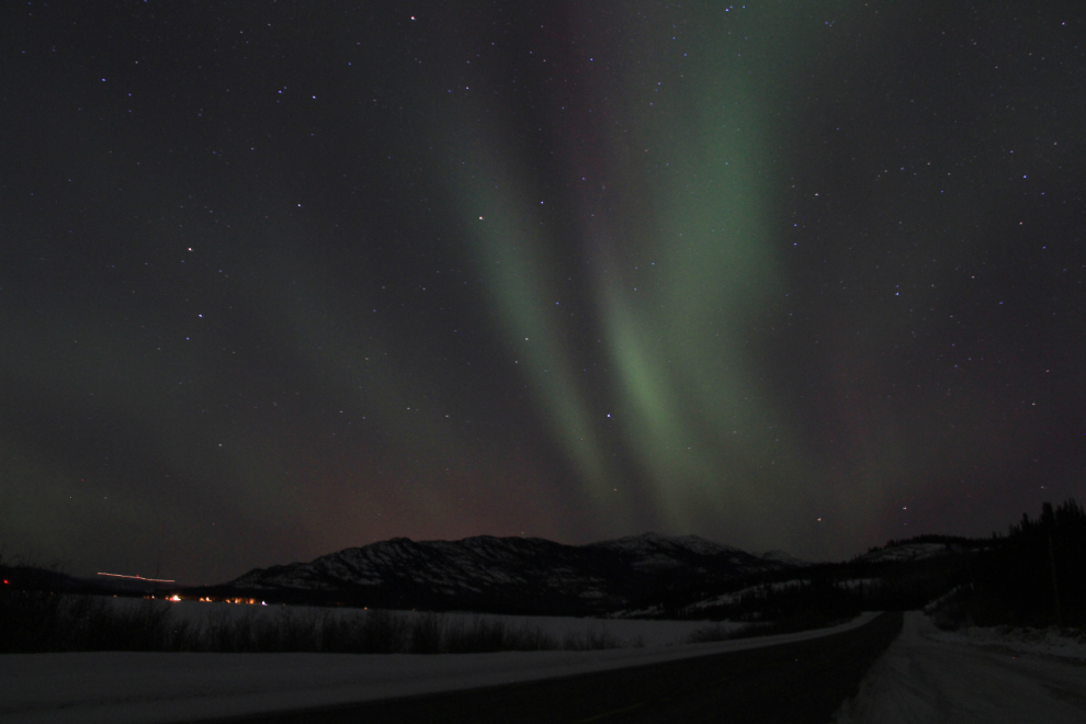 The aurora borealis over the Alaska Highway at Marsh Lake, Yukon