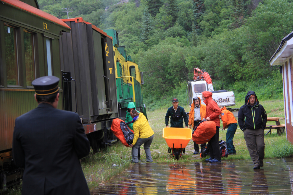 Loading camping gear onto a train at Bennett, British Columbia