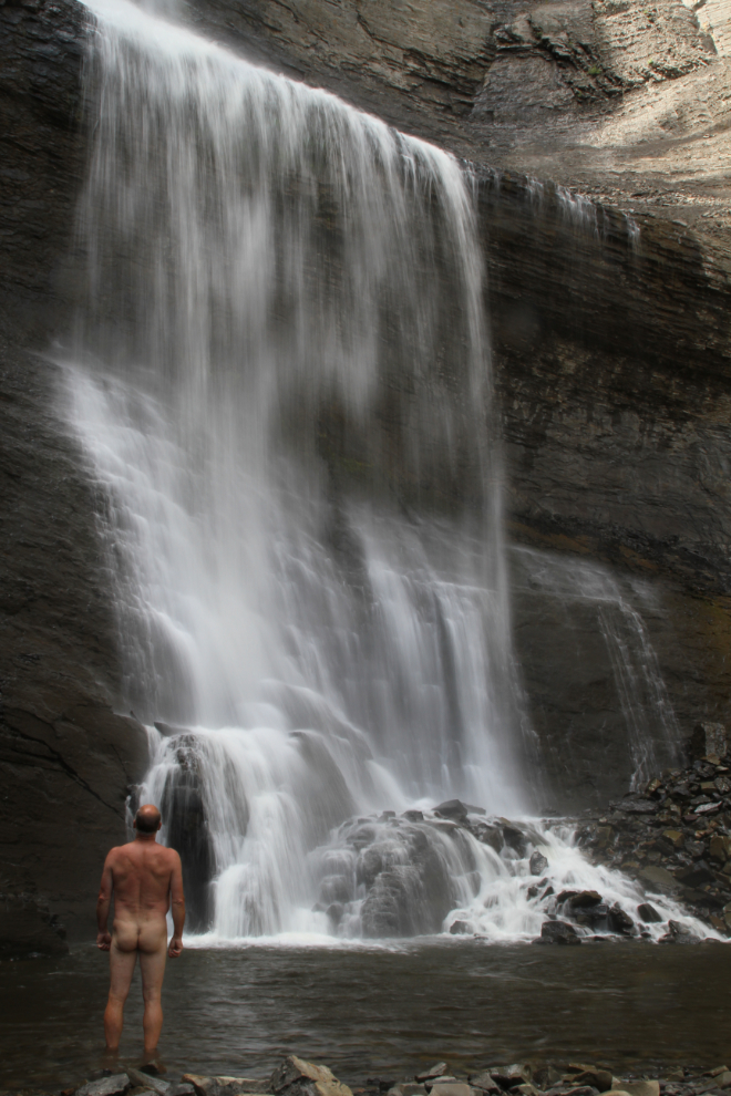 Naked in the spray of Bergeron Falls - Tumbler Ridge Geopark
