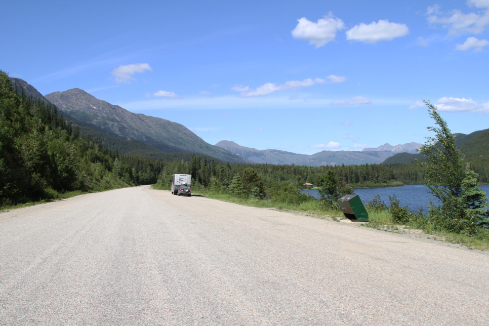 A wide, paved pullout along Pine Tree Lake on the Stewart-Cassiar Highway