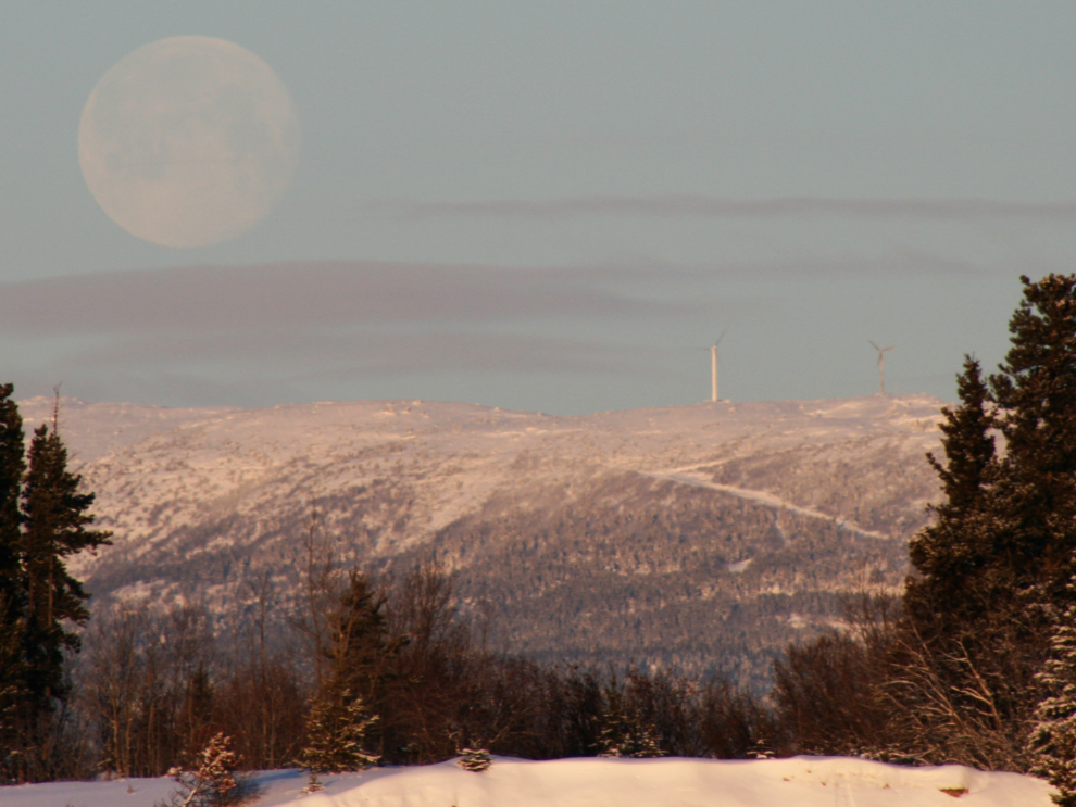 A dramatic setting moon in Whitehorse, Yukon, in December