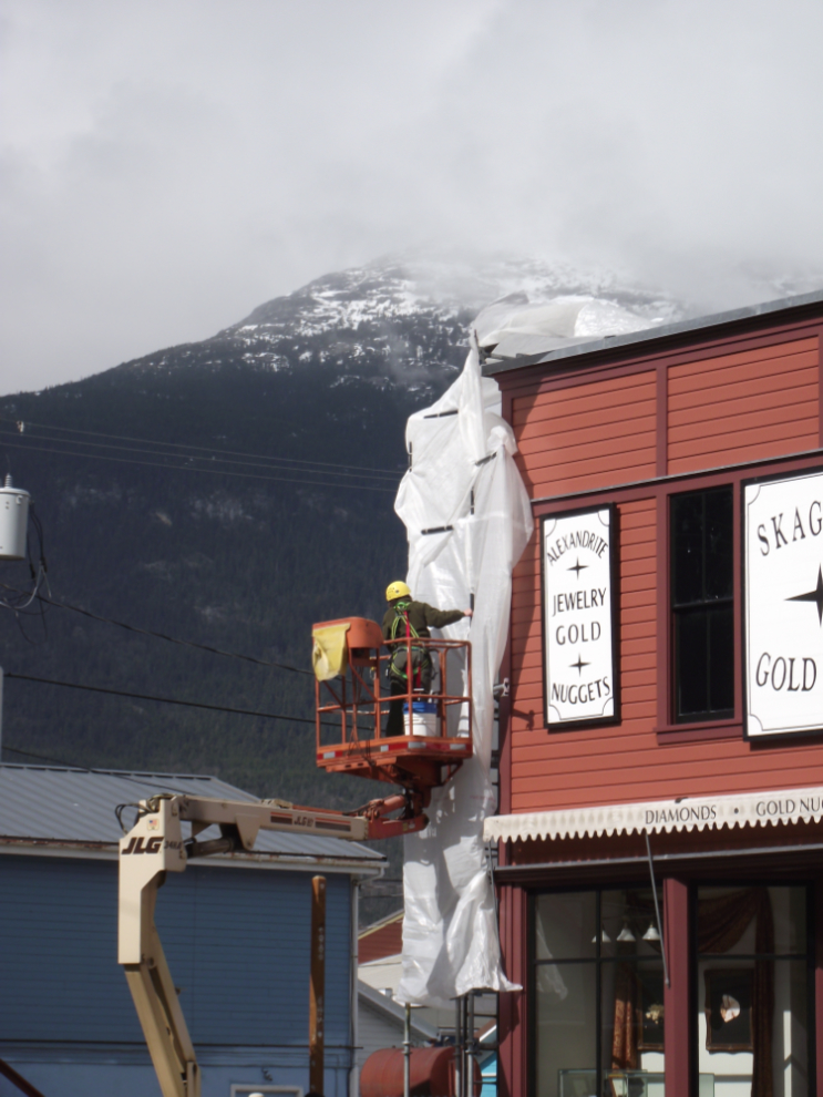 Spring building maintenance on Broadway in Skagway