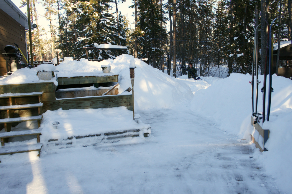 Cathy battling deep snow with a shovel