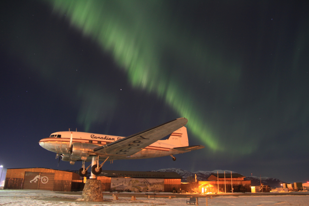 Aurora borealis over Douglas DC-3 CF-CPY at Whitehorse, Yukon