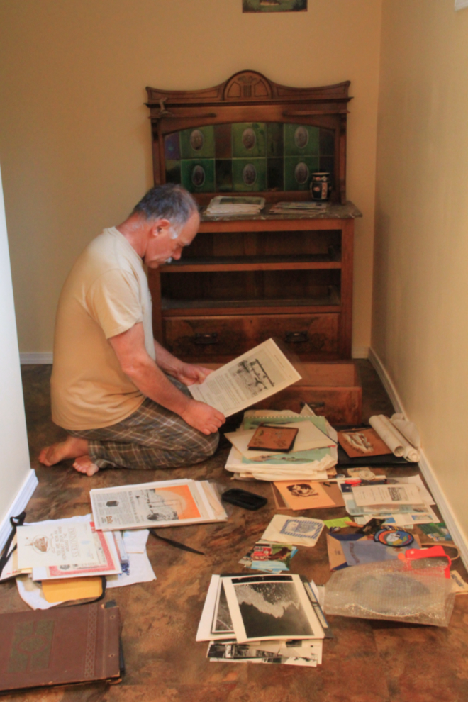 Murray Lundberg sorting through his historic papers