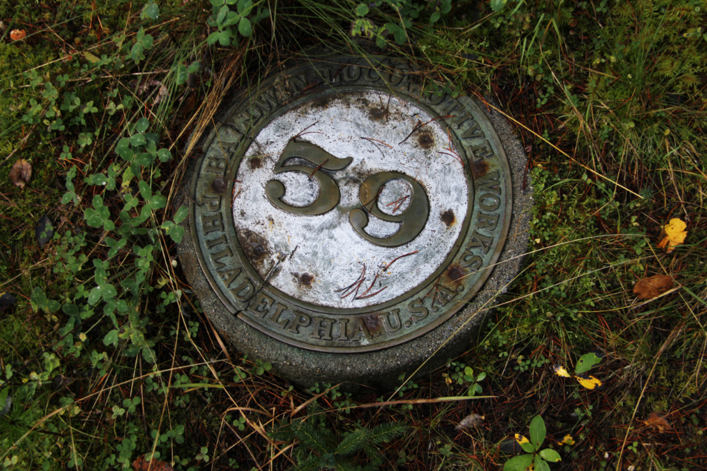 The nameplate for Baldwin locomotive #59 is on the grave of Roy E. Gault (1879-1949).