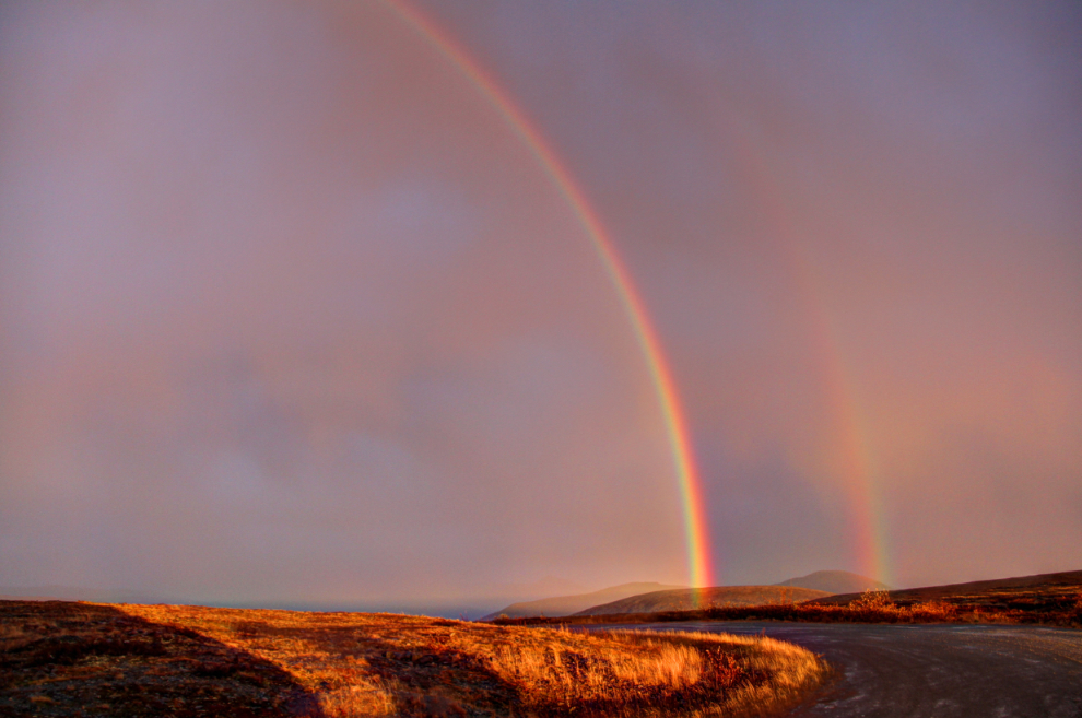 Fall rainbow at the summit of the Top of the World Highway, Yukon