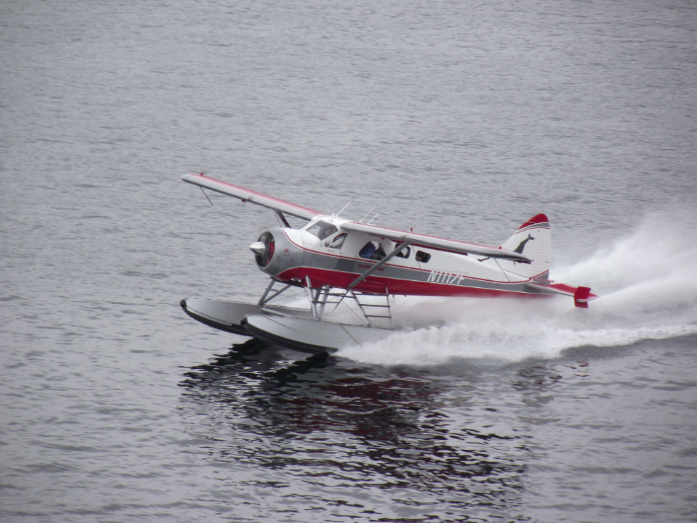 Island Wings' Beaver floatplane taking off Ketchikan, Alaska