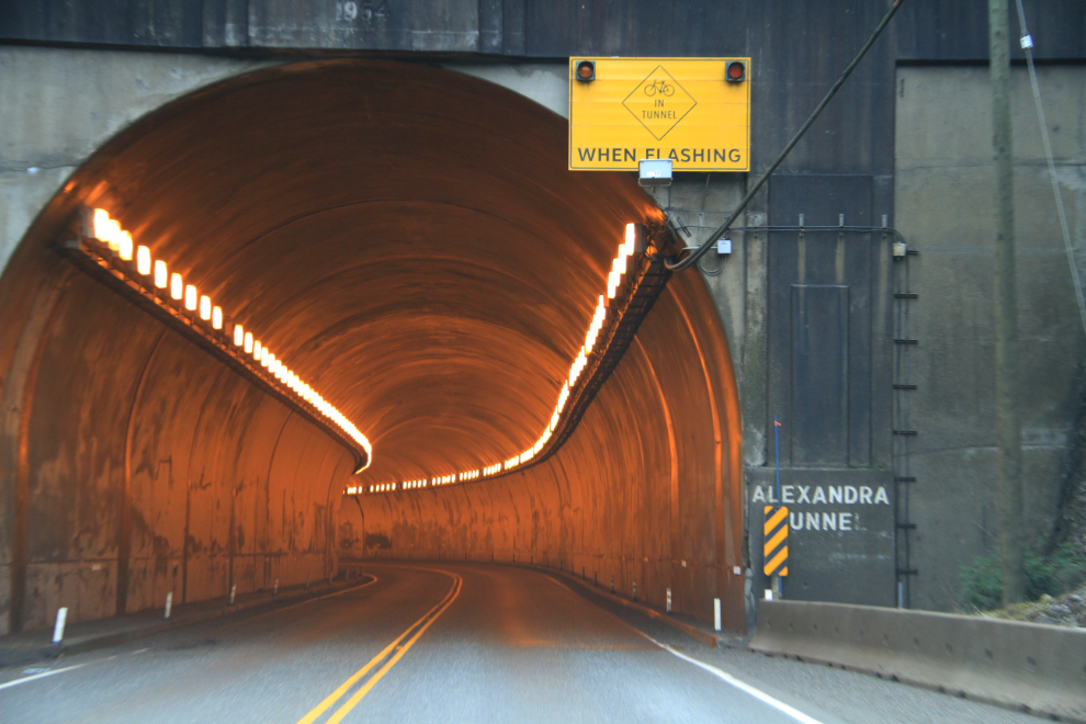 The entrance and cyclist warning lights in the Alexandra tunnel, Fraser Canyon, BC.