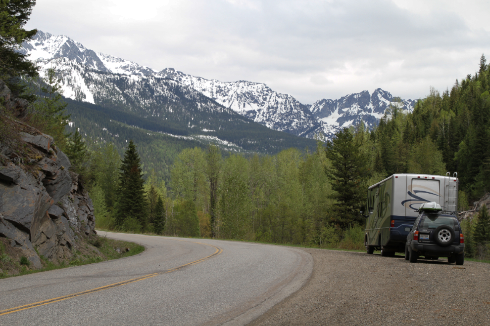 RV at a pullout among the high mountains along Highway 31A between New Denver and Kaslo