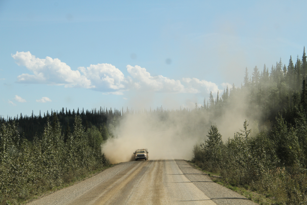 A road sweeper getting excess gravel off a section of new chipseal along the North Klondike Highway