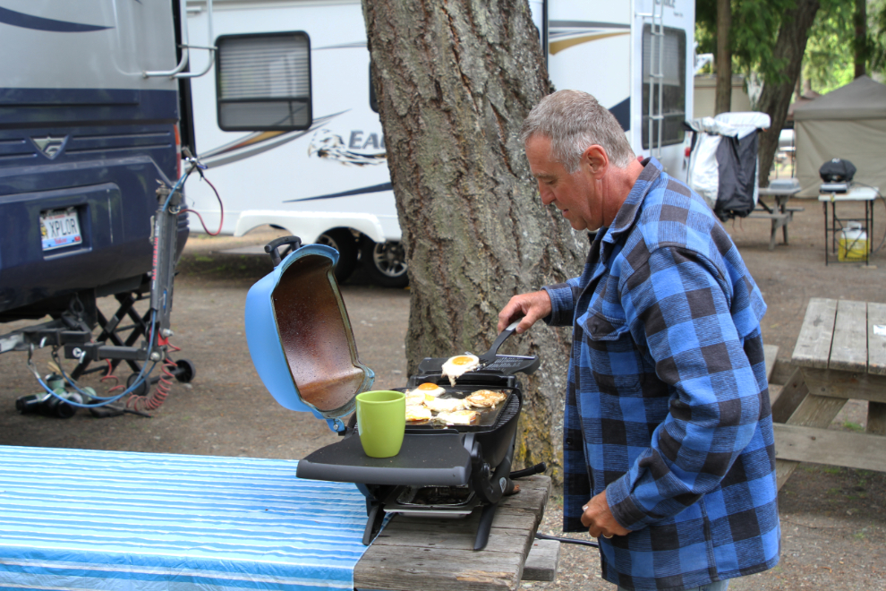 Cooking breakfast beside the RV at Centennial Park in New Denver, BC