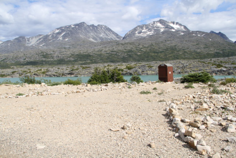 Parking and outhouse for Alaska Mountain Guides' Summit Lake canoe tour