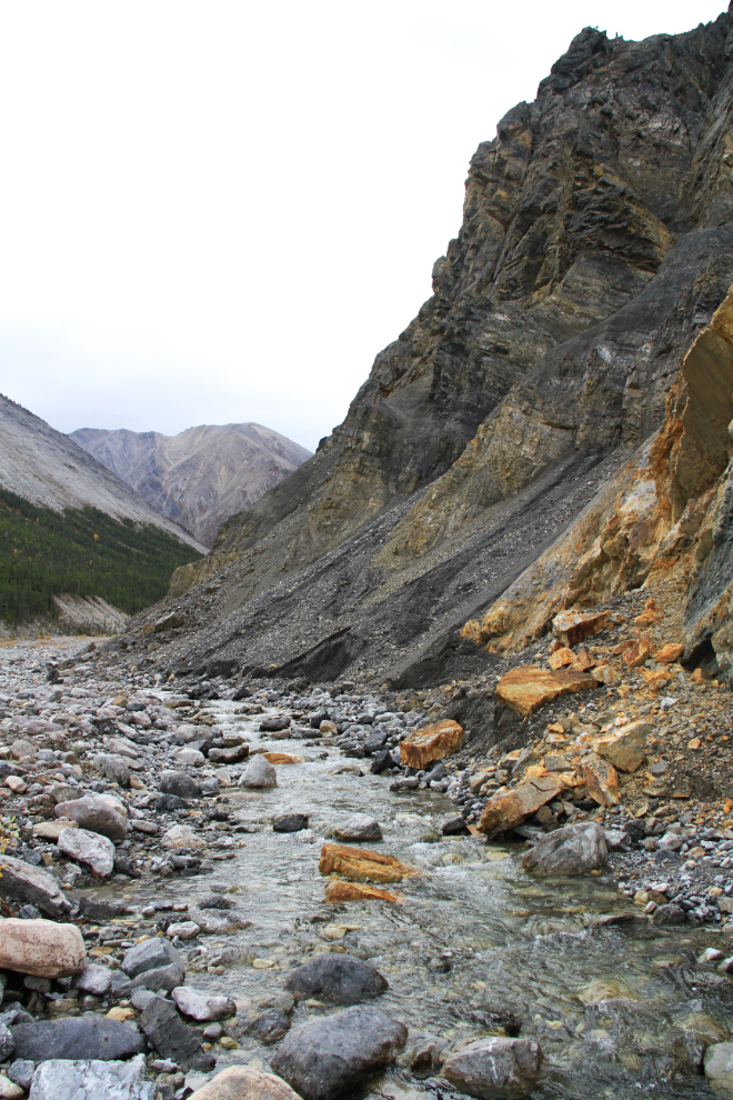Spectacular cliffs in a valley along Muncho Lake