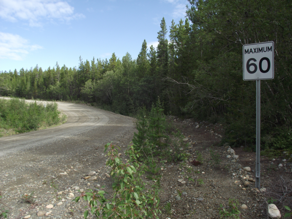 Speed limit sign on the South Canol Road, Yukon