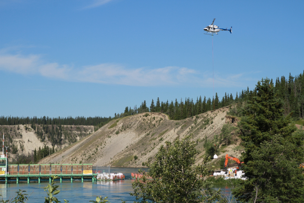 Sand-bagging the Lewes River Control Structure on the Yukon River