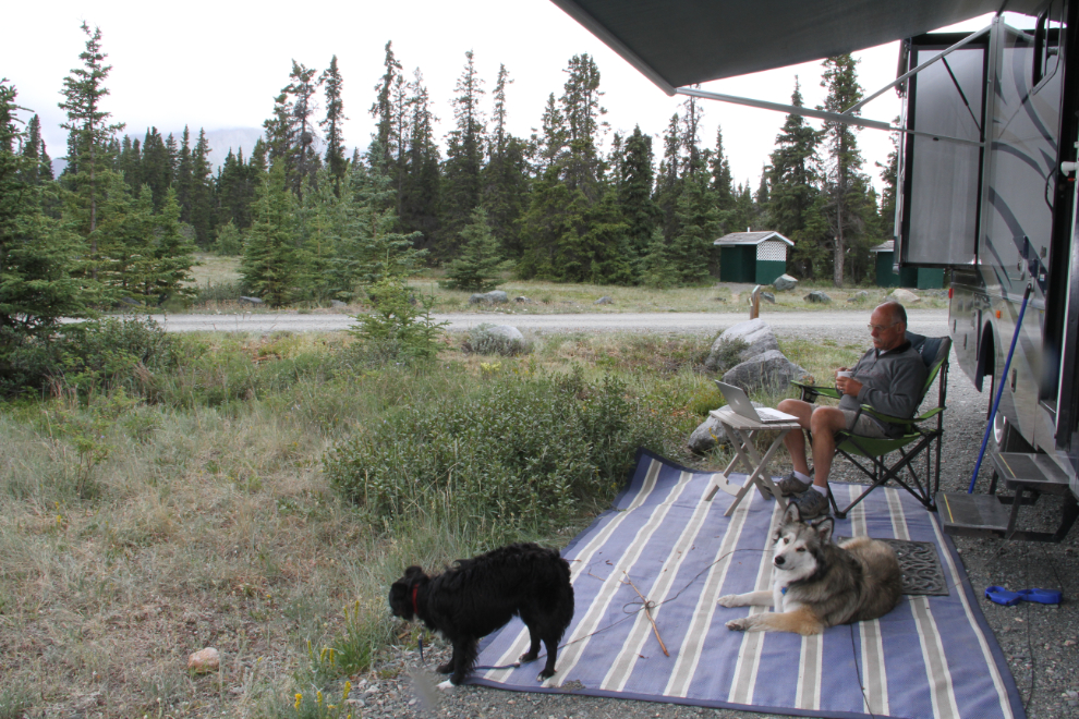 Murray Lundberg and his dogs at their RV at Congdon Creek Campground, Yukon