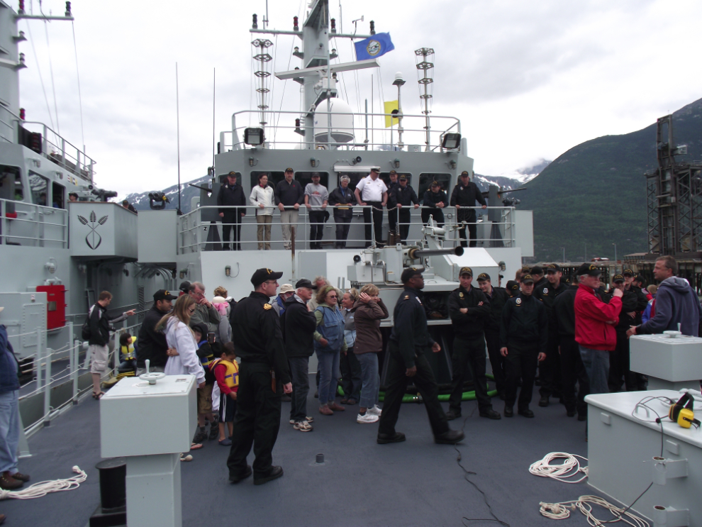 Setting up a group photo on HMCS Whitehorse at Skagway, Alaska